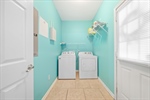 Laundry room with included washer and dryer.