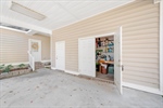 Storage or workshop area off the carport.