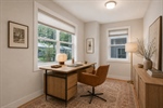 Virtually staged main level bonus room.