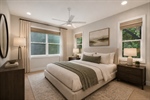 Virtually staged primary bedroom.