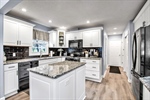 Sparkling cabinetry-center island-granite counters