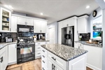 Kit:Lots of cabinets-vinyl flr-granite counters 