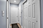 Hallway:Dr to garage-Bsmt dr-pantry sliding drs 