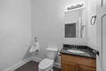 Basement half bath with potential to be a full