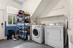 Laundry area. Generous storage in the home.