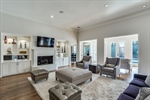 Great Room with gas log fireplace and built-ins