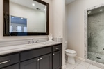 His side of Primary Bath has pass-through shower