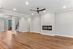 Crown moulding and contemporary fireplace.
