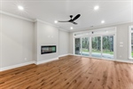 Sliding doors lead to the back porch.