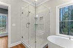 Enjoy a relaxing tub and separate shower.