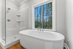Stand alone soaker bathtub.