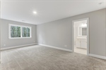 Third bedroom with private bathroom.