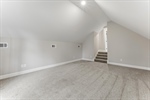 Huge family rec room on the upper level.