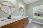 Expansive custom double vanity.