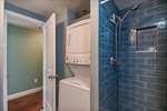 Features tiled shower and in-floor radiant heat