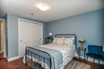 Guest bedroom offers ample storage in closet