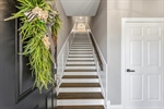 Ascend the stairs to your coastal retreat!