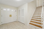 Entrance Foyer with Stairway to 2nd Floor