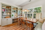 Dining area with custom built ins.
