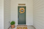 Enter into the home via the inviting front door.