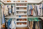 Amazing walk in closet with built ins.