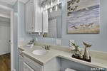 Stylish vanity and updated fixtures