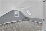 Upper level bedroom #4 with skylight