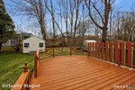 Freshly painted deck overlooking the backyard