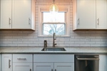 Bright window over kitchen sink