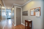Door to basement offers private storage unit