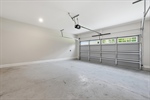 Attached two car garage with opener.