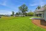 Covered back porch with grilling patio.