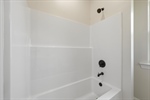 The 2nd bath features a shower over tub.