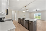 The great room flows into the stunning kitchen.