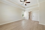 The primary suite features a private bath.