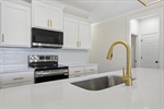 The island features an undermount sink.