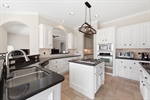 Spacious kitchen with island cooktop