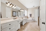Cultured marble counters and lots of light