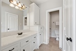 Tiled tubshower and lots of storage