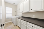 First floor laundry with lots of storage