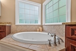 Relaxing jetted whirlpool bath.