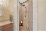 Separate walk in shower.