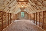 Upstairs is the walk in attic ready to be finished