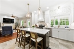 The living room is open to the renovated kitchen.