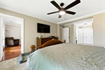 Refreshing lighted ceiling fan and ensuite bath.