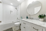 Second full bath with a shower over tub.