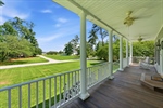 A classic double front porches greet you.