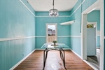 Light and bright formal dining room.