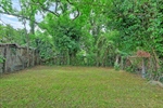 Outside enjoy the spacious and private backyard.