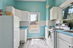 Plenty of white cabinetry.